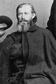 Father Jeremiah F. Trecy seated at left next to Father Fontaine.jpg